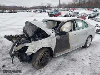 2015 Volkswagen Jetta Sedan 2.0L S with VIN 3VW2K7AJ2FM201632, listed as a IAAI auction lot 41523088 with 1 mi miles. Bid and sale history available at carsss.com. Image 2.