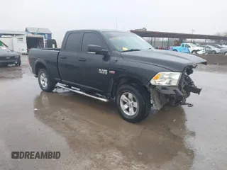 2014 Ram 1500 SLT z VIN 1C6RR7GT5ES435881, wystawiony jako IAAI lot #41470108 z przebiegiem 81 097 mil mil oraz . Historia ofert i sprzedaży dostępna na DreamBid. Obrazek 1.