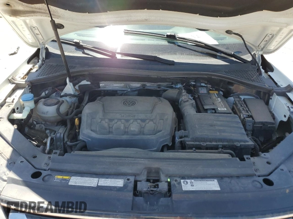 2018 Volkswagen Tiguan S with VIN 3VV0B7AX7JM065958, listed as a Copart auction lot 57598015 with 97,360 mi miles and Salvage title. Bid and sale history available at DreamBid. Image 12.
