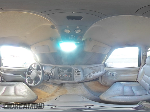 1999 Chevrolet Suburban with VIN 3GNEC16R7XG141671, listed as a Copart auction lot 77784174 with 207,234 mi miles and Salvage Title. Bid and sale history available at carsss.com. Image 14.