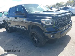 2019 Toyota Tundra SR5 z VIN 5TFDY5F12KX784117, wystawiony jako IAAI lot #41793581 z przebiegiem 99 736 mil mil oraz . Historia ofert i sprzedaży dostępna na DreamBid. Obrazek 1.
