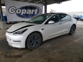 2022 Tesla Model 3 Long Range with VIN 5YJ3E1EB2NF267485, listed as a Copart auction lot 54952505 with 30,569 mi miles and Clean Title. Bid and sale history available at DreamBid. Image 1.
