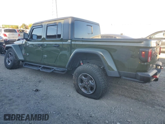 2021 Jeep Gladiator Rubicon with VIN 1C6JJTBM1ML599103, listed as a Copart auction lot 77084134 with 16,031 mi miles and Salvage title. Bid and sale history available at DreamBid. Image 2.