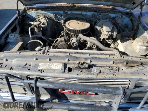 1991 GMC Suburban z VIN 1GKEV16K9MF510909, wystawiony jako Copart lot #81326004 z przebiegiem 216 778 mil mil oraz Tytuł czysty. Historia ofert i sprzedaży dostępna na DreamBid. Obrazek 12.