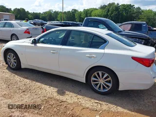 2015 Infiniti Q50 Premium with VIN JN1BV7ARXFM414391, listed as a IAAI auction lot 42245462 with 216,495 mi miles and . Bid and sale history available at DreamBid. Image 14.