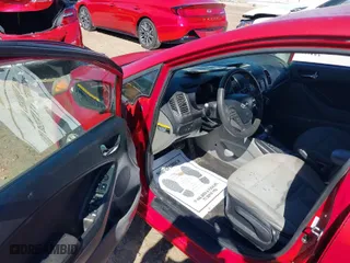 2014 Kia Forte LX with VIN KNAFX4A61E5176885, listed as a IAAI auction lot 41651277 with 76,769 mi miles. Bid and sale history available at carsss.com. Image 5.