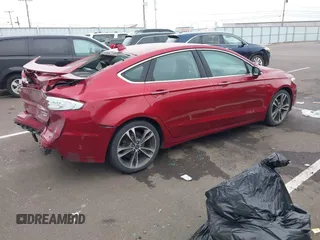 2019 Ford Fusion Titanium with VIN 3FA6P0K98KR179513, listed as a IAAI auction lot 41820059 with 112,155 mi miles. Bid and sale history available at carsss.com. Image 4.