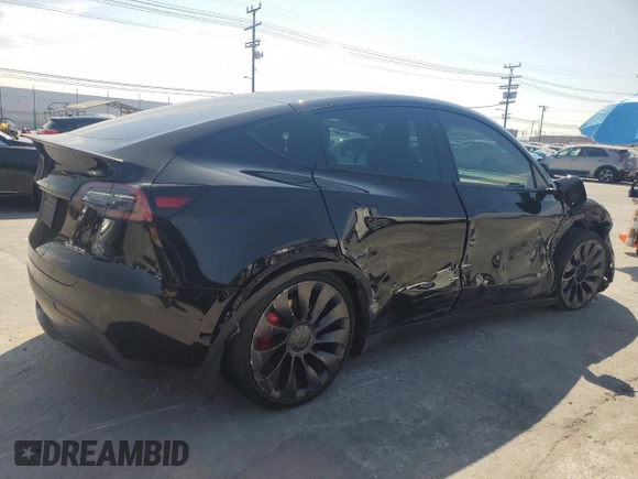 2022 Tesla Model Y Performance with VIN 7SAYGDEF6NF524171, listed as a Copart auction lot 60736945 with 30,629 mi miles and Salvage title. Bid and sale history available at DreamBid. Image 3.
