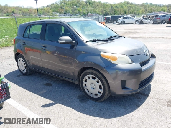 2008 Scion xD with VIN JTKKU10458J014660, listed as a IAAI auction lot 42100828 with 136,436 mi miles. Bid and sale history available at carsss.com. Image 1.