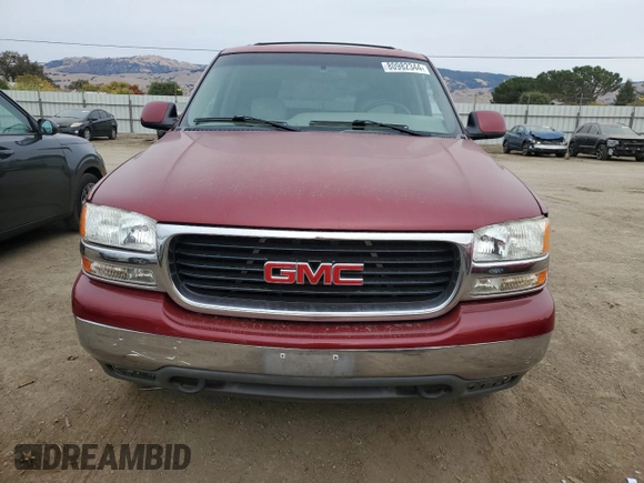 2001 GMC Yukon SLT z VIN 1GKEC13T21J302687, wystawiony jako Copart lot #80982344 z przebiegiem 139 565 mil mil oraz Szkoda całkowita • Salvage title. Historia ofert i sprzedaży dostępna na DreamBid. Obrazek 5.