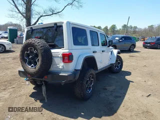 2023 Jeep Wrangler Rubicon with VIN 1C4JJXR68PW584303, listed as a IAAI auction lot 42049098 with 29,565 mi miles and . Bid and sale history available at DreamBid. Image 4.