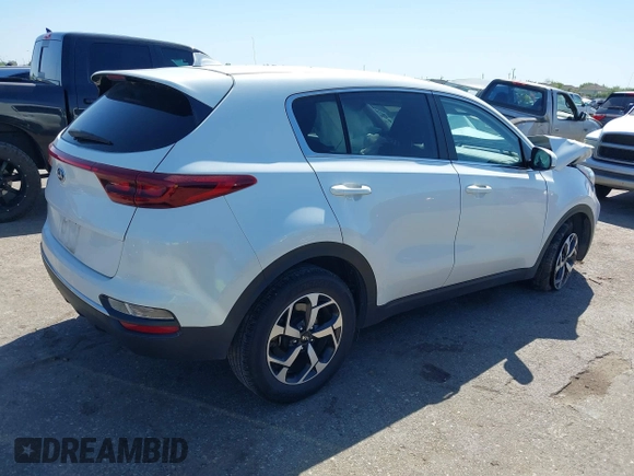 2021 Kia Sportage LX with VIN KNDPM3AC8M7932425, listed as a IAAI auction lot 39067549 with 56,841 mi miles. Bid and sale history available at carsss.com. Image 4.