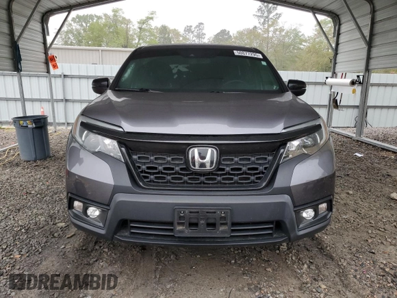 2021 Honda Passport EX-L with VIN 5FNYF7H54MB000620, listed as a Copart auction lot 50877295 with 46,109 mi miles and Salvage Title. Bid and sale history available at carsss.com. Image 5.
