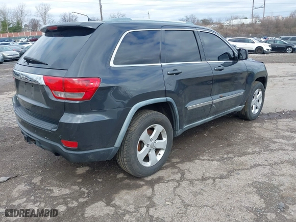 2011 Jeep Grand Cherokee Laredo with VIN 1J4RR4GG7BC721483, listed as a IAAI auction lot 41810180 with 181,558 mi miles. Bid and sale history available at carsss.com. Image 4.