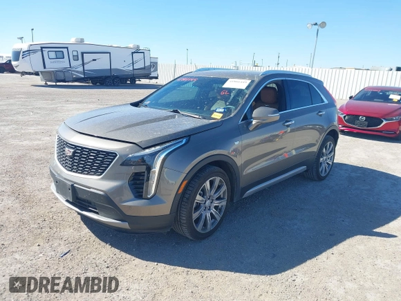 2020 Cadillac XT4 FWD Premium Luxury with VIN 1GYFZCR47LF052986, listed as a IAAI auction lot 41866449 with 56,422 mi miles and . Bid and sale history available at DreamBid. Image 2.
