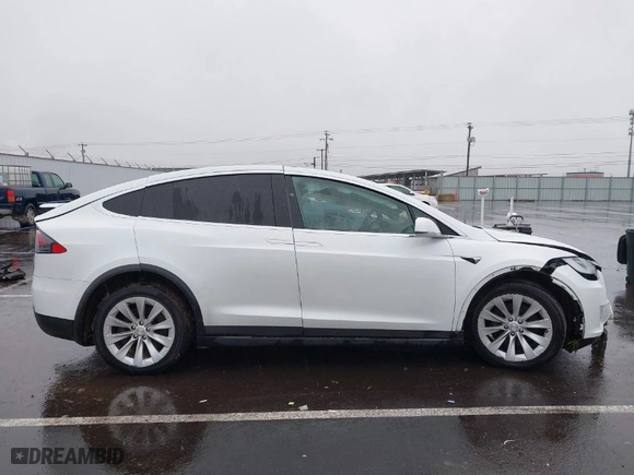 2019 Tesla Model X 75D with VIN 5YJXCBE22KF198905, listed as a IAAI auction lot 41221320 with NaN miles. Bid and sale history available at carsss.com. Image 14.