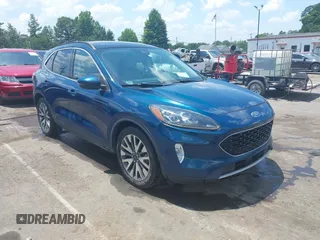 2020 Ford Escape Titanium Hybrid z VIN 1FMCU0DZXLUB38342, wystawiony jako IAAI lot #42578494 z przebiegiem 84 649 mil mil oraz . Historia ofert i sprzedaży dostępna na DreamBid. Obrazek 1.
