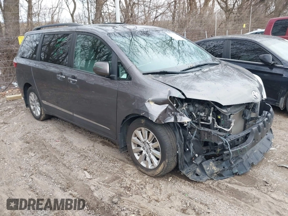 2015 Toyota Sienna Ltd with VIN 5TDDK3DCXFS100341, listed as a IAAI auction lot 41245558 with 114,854 mi miles. Bid and sale history available at carsss.com. Image 1.