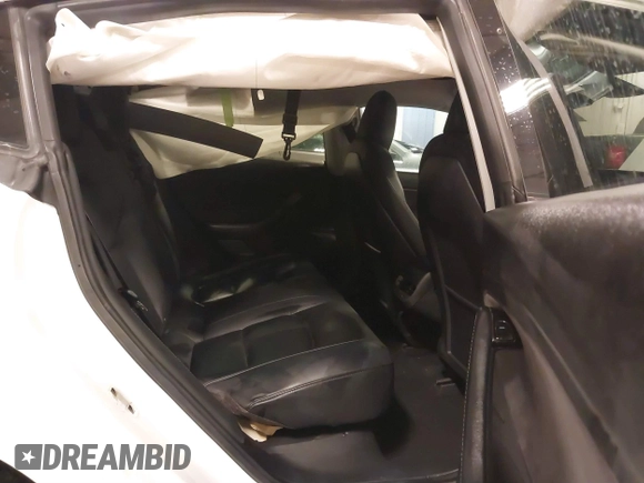 2018 Tesla Model 3 Long Range Battery with VIN 5YJ3E1EB5JF084446, listed as a IAAI auction lot 41209852 with 70,125 mi miles and . Bid and sale history available at DreamBid. Image 8.