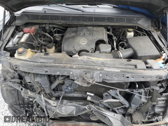 2012 Nissan Armada Platinum z VIN 5N1AA0NC4CN613049, wystawiony jako Copart lot #64414564 z przebiegiem 143 009 mil mil oraz Szkoda całkowita • Salvage title. Historia ofert i sprzedaży dostępna na DreamBid. Obrazek 13.