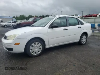 2007 Ford Focus S z VIN 1FAFP34N57W344093, wystawiony jako Copart lot #57180515 z przebiegiem 116 868 mil mil oraz Czysty tytuł • Clean title. Historia ofert i sprzedaży dostępna na DreamBid. Obrazek 1.