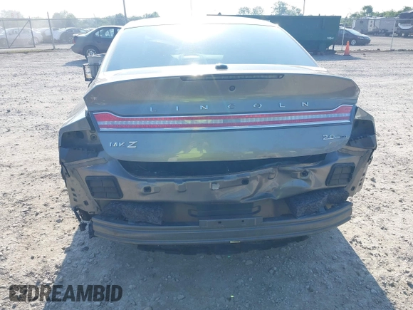2016 Lincoln MKZ z VIN 3LN6L2G96GR601677, wystawiony jako IAAI lot #42647759 z przebiegiem 87 283 mil mil oraz . Historia ofert i sprzedaży dostępna na DreamBid. Obrazek 6.