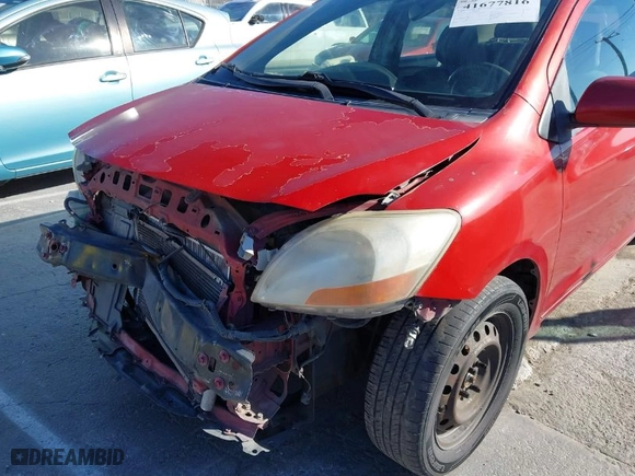 2010 Toyota Yaris with VIN JTDBT4K37A1375975, listed as a IAAI auction lot 41677816 with 170,739 mi miles. Bid and sale history available at carsss.com. Image 18.