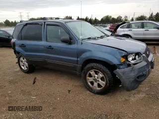 2005 Ford Escape XLT with VIN 1FMYU93145KD64154, listed as a Copart auction lot 74373964 with 85,906 mi miles and Salvage Title. Bid and sale history available at carsss.com. Image 4.