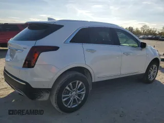2023 Cadillac XT5 FWD Premium Luxury with VIN 1GYKNCRS7PZ150378, listed as a Copart auction lot 84757014 with 21,631 mi miles and Salvage Title. Bid and sale history available at carsss.com. Image 3.