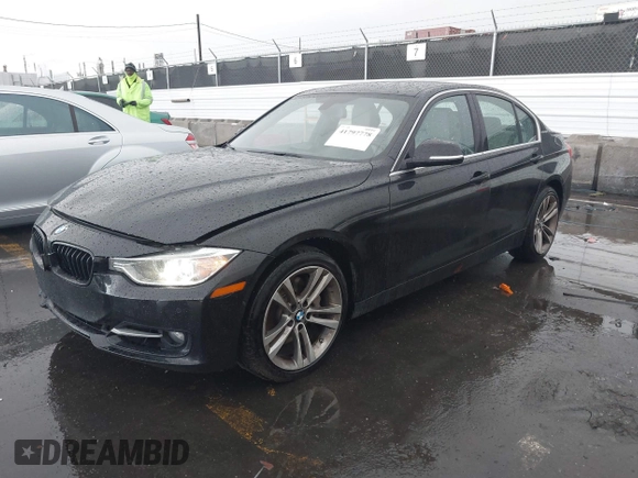 2013 BMW 3 Series ActiveHybrid 3 with VIN WBA3F9C57DF483994, listed as a IAAI auction lot 41797778 with 92,313 mi miles. Bid and sale history available at carsss.com. Image 2.