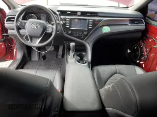 2018 Toyota Camry LE с VIN 4T1B11HK7JU556202, выставлен на аукционе Copart как лот 54951055 с пробегом 55 896 миль миль и Списание • Salvage title. История ставок и продаж доступна на DreamBid. Изображение 8.