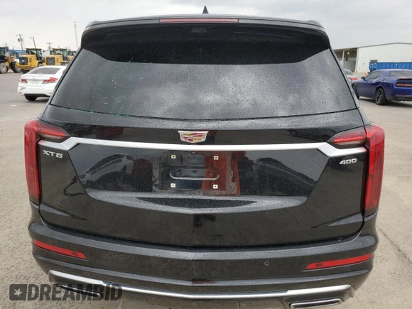 2021 Cadillac XT6 Premium Luxury z VIN 1GYKPERS0MZ181151, wystawiony jako Copart lot #78808104 z przebiegiem 31 697 mil mil oraz Szkoda całkowita • Salvage title. Historia ofert i sprzedaży dostępna na DreamBid. Obrazek 6.