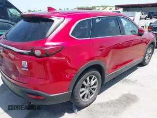 2018 Mazda CX-9 Touring with VIN JM3TCBCY6J0201556, listed as a IAAI auction lot 42285456 with 144,841 mi miles and . Bid and sale history available at DreamBid. Image 6.