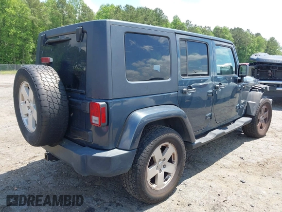 2007 Jeep Wrangler Unlimited Sahara with VIN 1J4GA59117L216687, listed as a IAAI auction lot 42188257 with 176,507 mi miles and . Bid and sale history available at DreamBid. Image 4.