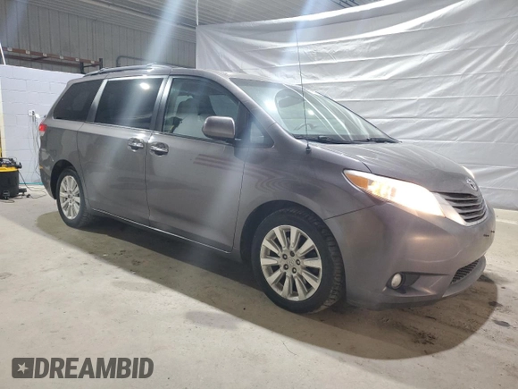 2013 Toyota Sienna XLE with VIN 5TDDK3DC6DS065469, listed as a Copart auction lot 48772565 with 143,966 mi miles and Salvage Title. Bid and sale history available at DreamBid. Image 4.