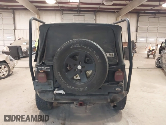1999 Jeep Wrangler Sahara z VIN 1J4FY49S4XP432567, wystawiony jako IAAI lot #41562455 z przebiegiem Nie podano mil oraz . Historia ofert i sprzedaży dostępna na DreamBid. Obrazek 16.