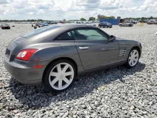 2004 Chrysler Crossfire with VIN 1C3AN69L64X015318, listed as a Copart auction lot 61139105 with 77,644 mi miles and Salvage title. Bid and sale history available at DreamBid. Image 3.