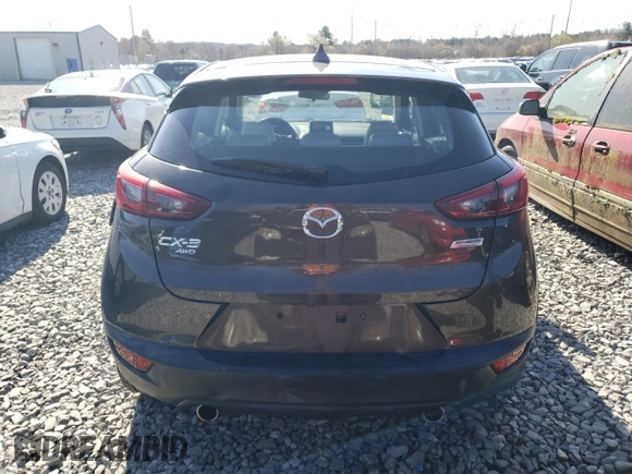 2016 Mazda CX-3 Grand Touring z VIN JM1DKBD7XG0107274, wystawiony jako Copart lot #52137385 z przebiegiem 35 376 mil mil oraz Szkoda całkowita • Salvage title. Historia ofert i sprzedaży dostępna na DreamBid. Obrazek 6.
