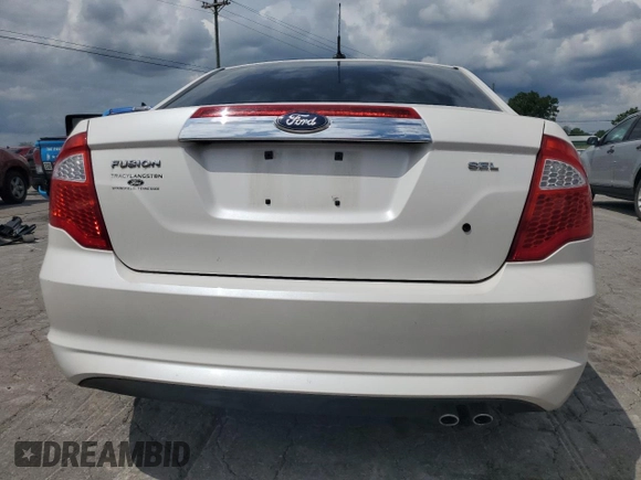2012 Ford Fusion SEL z VIN 3FAHP0JAXCR241497, wystawiony jako Copart lot #58884165 z przebiegiem 100 813 mil mil oraz Szkoda całkowita • Salvage title. Historia ofert i sprzedaży dostępna na DreamBid. Obrazek 6.