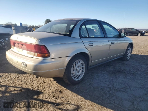 1999 Saturn SL with VIN 1G8ZK5270XZ147170, listed as a Copart auction lot 42169385 with 141,100 mi miles and Clean title. Bid and sale history available at DreamBid. Image 3.