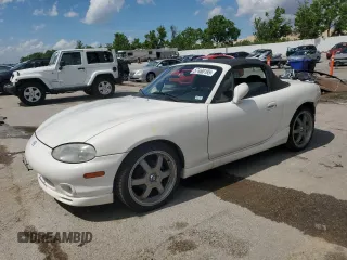 2000 Mazda MX-5 Miata z VIN JM1NB3531Y0152594, wystawiony jako Copart lot #57460195 z przebiegiem 78 139 mil mil oraz Szkoda całkowita • Salvage title. Historia ofert i sprzedaży dostępna na DreamBid. Obrazek 1.