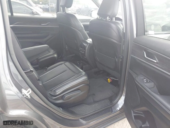 2023 Jeep Grand Cherokee L Limited with VIN 1C4RJKBG8P8844678, listed as a IAAI auction lot 42028956 with 49,559 mi miles. Bid and sale history available at carsss.com. Image 8.