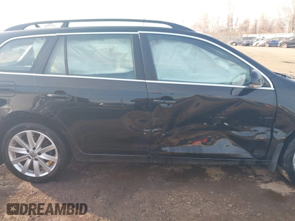 2012 Volkswagen Jetta SportWagen TDI with VIN 3VWPL7AJ8CM702152, listed as a IAAI auction lot 41770833 with 129,621 mi miles. Bid and sale history available at carsss.com. Image 13.