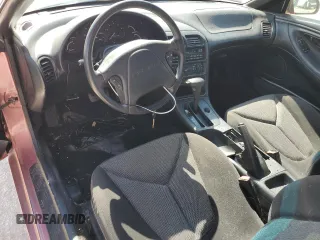 1994 Ford Probe z VIN 1ZVLT20A8R5118934, wystawiony jako Copart lot #73300464 z przebiegiem 87 900 mil mil oraz Szkody całkowita. Historia ofert i sprzedaży dostępna na DreamBid. Obrazek 8.