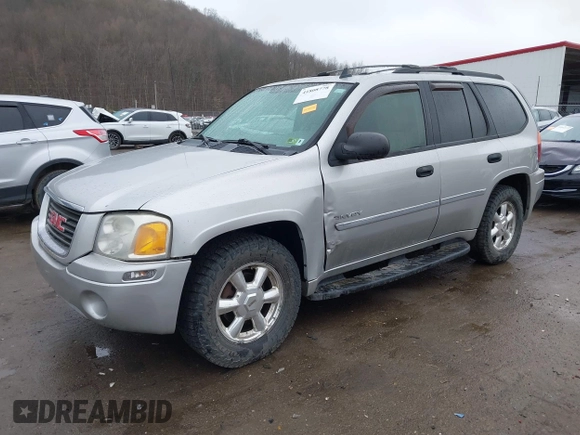 2006 GMC Envoy SLE z VIN 1GKDT13S562187698, wystawiony jako IAAI lot #41808778 z przebiegiem 167 023 mil mil oraz . Historia ofert i sprzedaży dostępna na DreamBid. Obrazek 18.