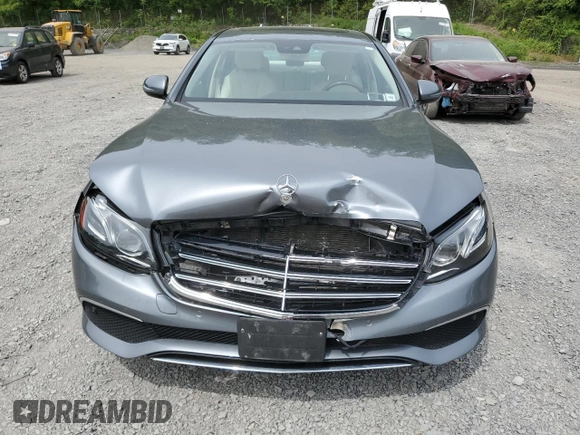 2018 Mercedes-Benz E 300 with VIN WDDZF4KBXJA337966, listed as a Copart auction lot 58718355 with 54,264 mi miles and Salvage title. Bid and sale history available at DreamBid. Image 5.