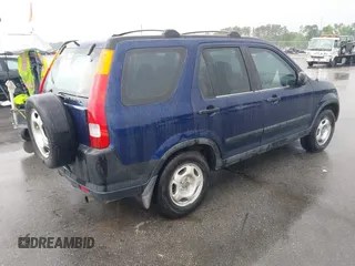 2004 Honda CR-V LX with VIN SHSRD68404U201676, listed as a IAAI auction lot 42109894 with 281,006 mi miles and . Bid and sale history available at carsss.com. Image 4.