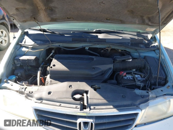 2004 Honda Odyssey EX-L with VIN 5FNRL18944B043710, listed as a IAAI auction lot 41862417 with 380,589 mi miles and . Bid and sale history available at DreamBid. Image 10.
