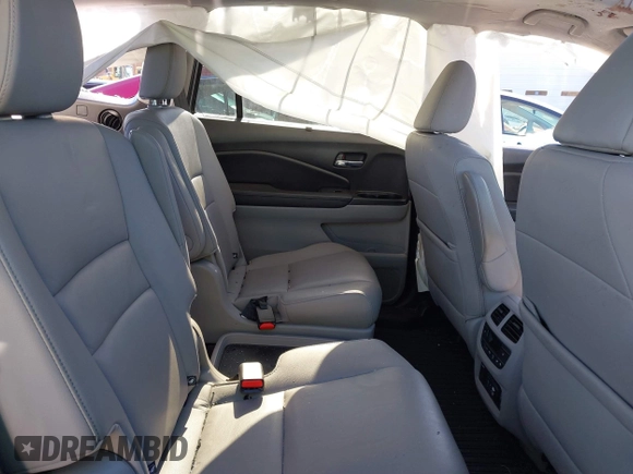 2019 Honda Pilot Touring 7-Passenger with VIN 5FNYF6H60KB038846, listed as a IAAI auction lot 41339385 with Not provided miles and . Bid and sale history available at DreamBid. Image 8.
