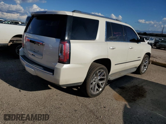 2015 GMC Yukon Denali with VIN 1GKS2CKJ0FR508598, listed as a Copart auction lot 71212924 with 133,220 mi miles and Salvage Title. Bid and sale history available at carsss.com. Image 3.